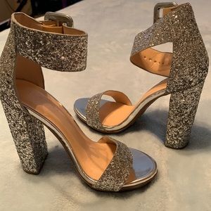 Silver glitter high heels.